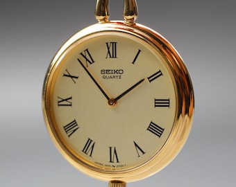 Vintage Seiko Womens Pocket Watch, 1983, Minimalist Quartz, Ref. 1400-0800, 27mm Gold Plated, Roman Numerals, Near MINT from Japan