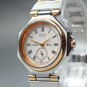 Reloj Seiko Silver Wave vintage para mujer, 1982, cuarzo, Ref. 1428-0060, esfera blanca, 26 mm, bicolor, números romanos, procedente de Japón.