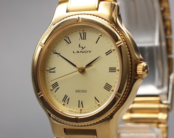 Vintage Seiko Landy Mens Watch, 1987, Minimalist Quartz, 33mm Gold Plated, Sapphire Crystal, Roman Numerals, Near MINT from Japan