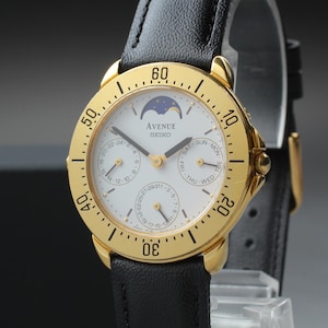 Reloj de vestir vintage Seiko Avenue para hombre, 1990, cuarzo minimalista, fase lunar, 32 mm, chapado en oro, cristal de zafiro, casi nuevo, procedente de Japón.