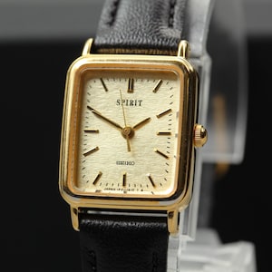 ヴィンテージ SEIKO 1F21-5F50 シェル雲模様文字盤 1995年製 Seiko 1f21 - Etsy