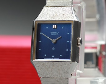 Vintage SEIKO Rivoli 2E20-753A Blue Dial Silver Quartz 14mm Dress
