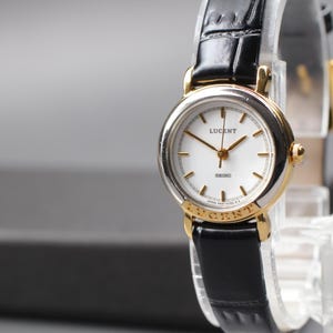 Vintage 1991 Seiko Lucent 4N21-036A Two-Tone Gold Steel White Dial Sapphire Crystal Women's Quartz Watch from Japan