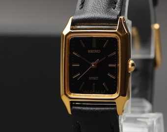 Reloj vintage Seiko Spirit Tank para mujer, 1995, cuarzo minimalista, esfera negra, 19 mm chapado en oro, cristal de zafiro, casi nuevo, de Japón.