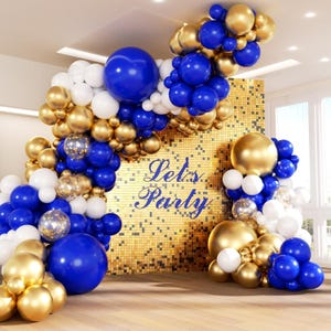 May include: A balloon arch decoration featuring a mix of royal blue, metallic gold, and white balloons in various sizes, including some clear balloons with gold confetti. A gold sequin backdrop is centered with the blue text Let's Party.