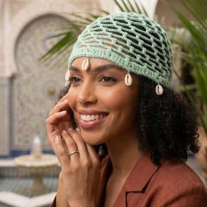 Handmade Mint Green Crochet Mesh Beanie with Natural Cowrie Shells, Boho Summer Headpiece, Breathable Cotton Festival Hat, Artisan Gift