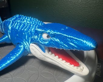 Giocattolo Mosasauro articolato: Dinosauro flessibile blu scintillante