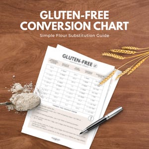 May include: A gluten-free conversion chart with the text "Gluten-Free Conversion Chart" and "Simple Flour Substitution Guide". A spoon of flour sits next to the chart, with a pen and wheat stalks.