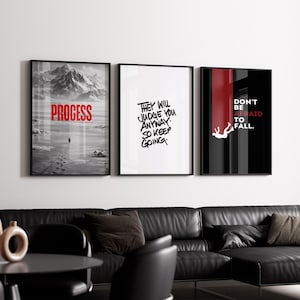 May include: Three framed art prints with motivational quotes. The first print says "PROCESS" over a mountain scene. The second print reads "THEY WILL JUDGE YOU ANYWAY. SO KEEP GOING." The third print says "DON'T BE AFRAID TO FALL."