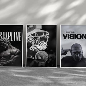 May include: Three framed black and white motivational posters. The first says "DISCIPLINE" with a statue. The second shows a basketball going into a hoop with the word "Addiction." The third says "TRUST YOUR VISION."