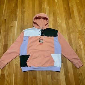 Geüpcycled hoodie met Nike groeten blokpatch