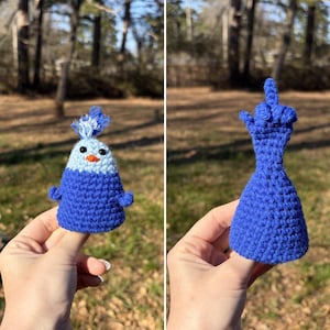 May include: A white ceramic mug with a black handle and the text "But First, Coffee" in a black, bold font. The mug is on a white surface. The mug is 10 cm tall.