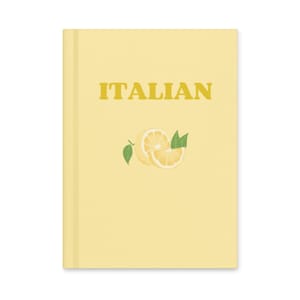May include: A light yellow notebook with the word "ITALIAN" in gold letters. A lemon illustration with green leaves is below the text. The notebook has a simple, clean design.