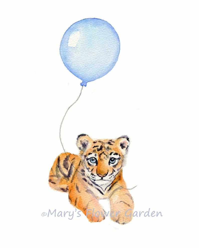 May include: A watercolor painting of a tiger cub lying down with a blue balloon floating above it. The tiger cub has orange and black stripes and blue eyes. The balloon is tied to a string that is attached to the tiger cub's paw.