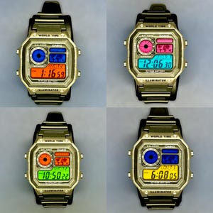May include: Four digital watches with gold-colored cases and black bands are displayed. Each watch face shows different times and world maps in various colors, including blue, orange, pink, and green. The watches have multiple buttons and the text "WORLD TIME" and "ILLUMINATOR".