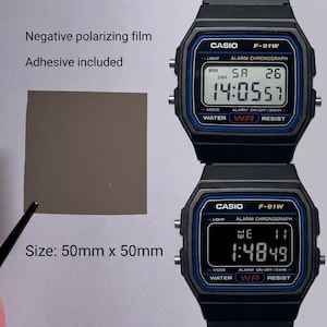 May include: Two black Casio F-91W digital watches with blue accents are displayed. A square of negative polarizing film, 50mm x 50mm, is shown with the text "Negative polarizing film" and "Adhesive included".