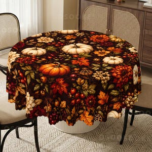 May include: A round tablecloth featuring a dark brown background with a repeating pattern of white and orange pumpkins, red berries, and multicolored autumn leaves including shades of yellow, orange, and deep red, covering the entire surface.