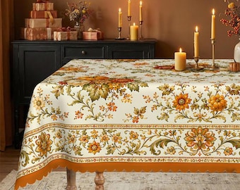 Mantel floral de cosecha otoñal: decoración de comedor vintage con calabazas y dalias.