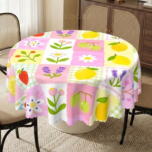 May include: A round tablecloth featuring a grid pattern of alternating squares in pink, white, and yellow. The design includes illustrations of yellow lemons, green olives, purple lavender sprigs, and white flowers with green stems and leaves.