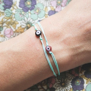 evil eye string bracelet / friendship bracelet / aqua string bracelet/ lucky charm bracelet/ pastel bracelet