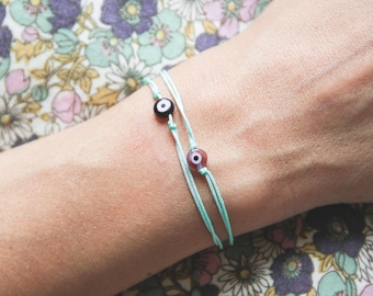 evil eye string bracelet / friendship bracelet / aqua string bracelet/ lucky charm bracelet/ pastel bracelet