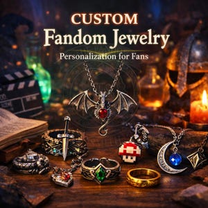 May include: An assortment of custom fandom jewellery, including necklaces, rings, and bracelets. The image features a dragon pendant, a sword-in-stone ring, and a pixelated mushroom charm. Text reads "CUSTOM Fandom Jewelry, Personalization for Fans."