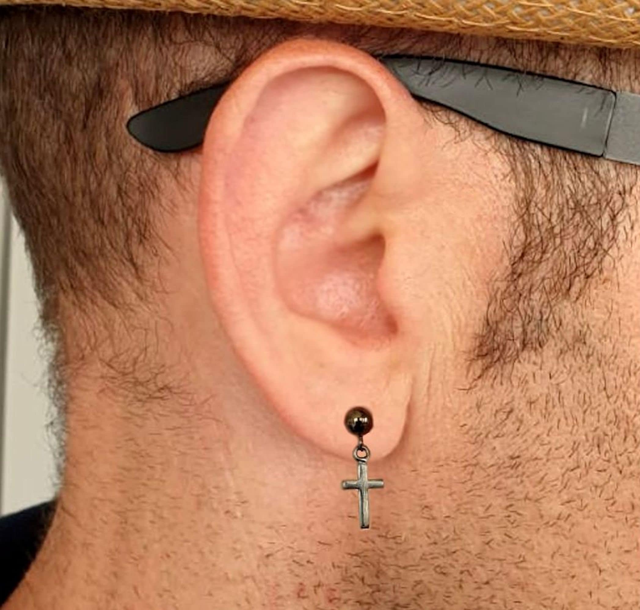Hanging hotsell cross piercing