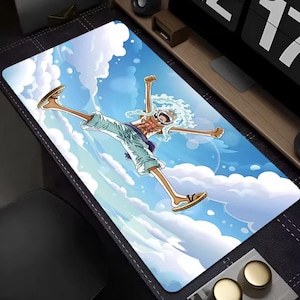 May include: A rectangular mouse mat with a colourful illustration of a character from the anime series One Piece. The character is shown mid-air against a blue sky with white clouds. The character is wearing sandals and light blue trousers.