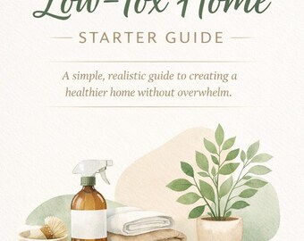 May include: A book cover with the title "Low-Tox Home Starter Guide" in green script. The image features a brown spray bottle, a small bowl with a brush, folded towels, and a potted plant. The background has soft, abstract shapes.