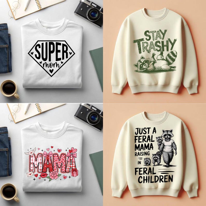 K&ouml;nnte beinhalten: Vier Sweatshirts mit grafischen Designs. Ein wei&szlig;es Sweatshirt hat "SUPER mom" in Diamantenform. Ein cremefarbenes Sweatshirt hat einen Waschb&auml;ren und den Text "STAY TRASHY". Ein weiteres wei&szlig;es Sweatshirt sagt "MAMA" mit Herzen und Blumen. Das letzte cremefarbene Sweatshirt sagt "JUST A FERAL MAMA RAISING IN FERAL CHILDREN".