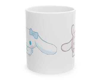 Taza de cerámica con caras de conejo pastel