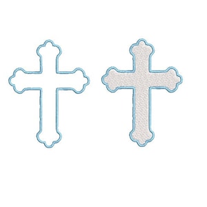 May include: Two embroidered crosses, one white with a light blue outline and one light gray with a light blue outline.