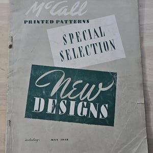May include: Vintage McCall's printed patterns catalog. The cover is a light gray with the text "McCall" and "PRINTED PATTERNS" in a darker gray. It features a white rectangle with "SPECIAL SELECTION" and a teal rectangle with "NEW DESIGNS". Includes "MAY 1948".