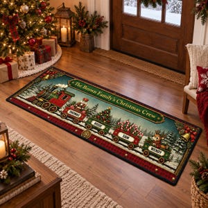 May include: A rectangular Christmas-themed floor mat featuring a festive train illustration with the text The Brown Family's Christmas Crew. The train cars are labeled with the names Thomas, Rosie, Sam, and Wendy, decorated with holiday motifs.