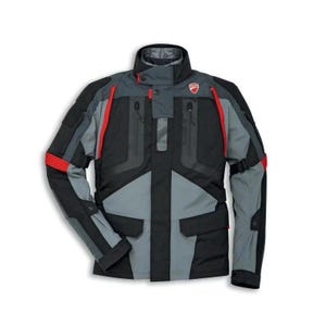 May include: A black, grey, and red motorcycle jacket with a high collar and multiple pockets. The Ducati logo is visible on the chest. Red accents are present on the sleeves and front of the jacket.