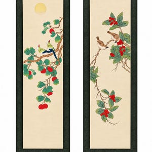 May include: A pair of vertical wall scrolls featuring paintings on a cream background. The left scroll shows two birds on a branch with red fruit and a yellow sun. The right scroll depicts two brown birds perched on a branch with green leaves and red berries.