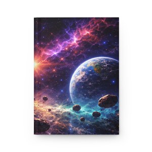 May include: A hardcover journal featuring a vibrant space scene. The cover displays a blue and green planet, surrounded by asteroids, nebulae, and stars in shades of purple, orange, and blue. The journal is rectangular and has a white spine.