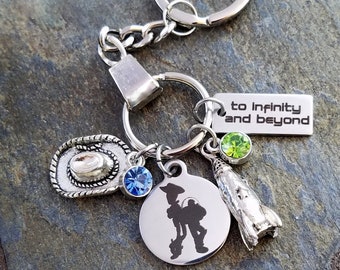 Personalized Woody Buzz Lightyear Toy Story To infinity and Beyond Movie Inspired Charm Keychain Space ship Cowboy Hat Rocket ship Keyring
