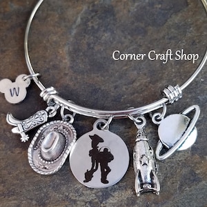 TOY STORY Woody Buzz Lightyear Inspired Bangle Charm Bracelet Cowboy Boot Hat Spaceship Personalized Stamped Initial Charm