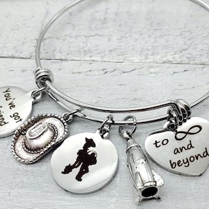 TOY STORY Woody Buzz Lightyear Inspired Bangle Charm Bracelet You&#39;ve got a friend in me To infinity and beyond BFF Option To personalize