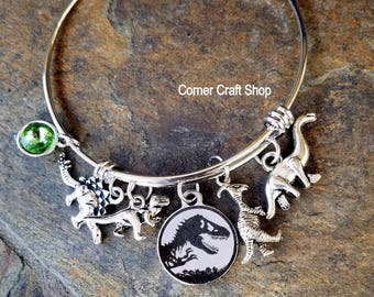 Dinosaur Jurassic Inspired Stainless Steel Charm  Silver Bangle Bracelet Stegosaurus TRex Brontosaurus Movie Bracelet option to personalize