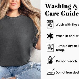 May include: A charcoal gray short-sleeved t-shirt paired with a washing and care guide featuring icons and text: Washing & Care Guide, Wash with like colors, Wash in cool water, Tumble dry at low-temp, Do not bleach, and Do not iron design.