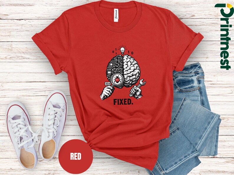 May include: A red short-sleeved t-shirt featuring a graphic of a brain split between a circuit board and organic tissue. The design includes a magnifying glass over a bug, a wrench, a lightbulb, binary code, and the text "404" and "FIXED."