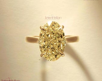 Anillo de compromiso con diamante amarillo canario ovalado cultivado en laboratorio de 4,50 quilates, certificado por IGI.
