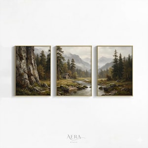 May include: A triptych of framed landscape paintings. Each artwork depicts a tranquil forest scene with a river, mountains, and a small cabin. The art has a vintage style with muted colours and gold frames. The paintings are displayed on a white wall.