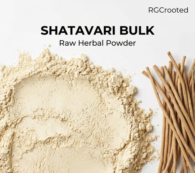 May include: A close-up of Shatavari Bulk Raw Herbal Powder. The image shows a pile of light beige powder and a bundle of thin, brown sticks. The text "SHATAVARI BULK" and "Raw Herbal Powder" is displayed in black font.