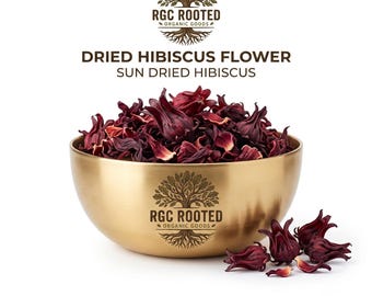 May include: A gold-toned metal bowl filled with deep red dried hibiscus flowers. The bowl features the RGC ROOTED ORGANIC GOODS tree logo. Above the bowl, the text reads DRIED HIBISCUS FLOWER SUN DRIED HIBISCUS. Several dried flowers lie nearby.