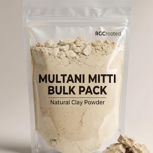 May include: A transparent plastic bag containing Multani Mitti bulk pack, a natural clay powder. The bag is labelled "Multani Mitti Bulk Pack" and "Natural Clay Powder". Several beige clay rocks are scattered around the bag.