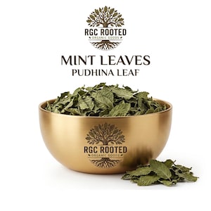 May include: A gold-toned metal bowl filled with dried green mint leaves, with a few loose leaves at the base. The bowl features the RGC ROOTED ORGANIC GOODS logo, which is also printed above the text MINT LEAVES PUDHINA LEAF in dark brown.