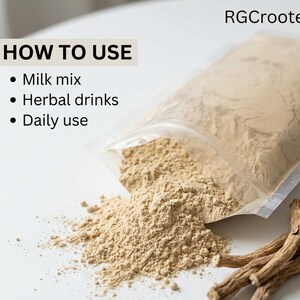 May include: A transparent pouch of beige powder, with some spilled onto a white surface. The text "HOW TO USE" is above bullet points listing "Milk mix", "Herbal drinks", and "Daily use". Dried roots are in the foreground. The text "RGCrooted" is in the upper right.